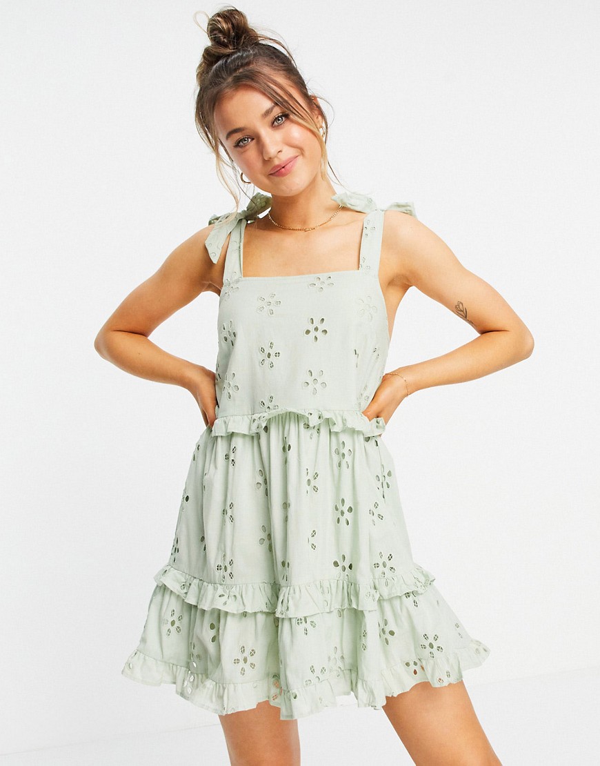 ASOS DESIGN broderie ruffle swing mini sundress with tie straps in sage ...