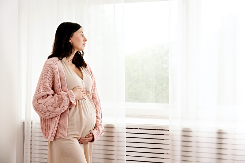 Pregnant Woman Pink Cardigan Dress