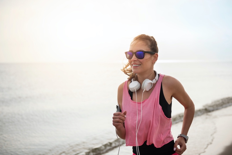 Woman Running Sunglasses Pink Tank Top