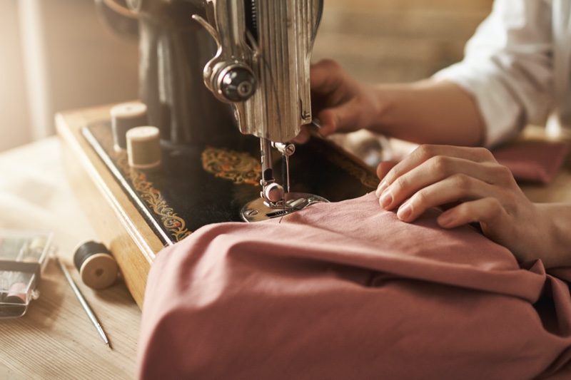 Woman Using Sewing Machine
