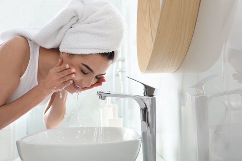 Woman Washing Face Bathroom