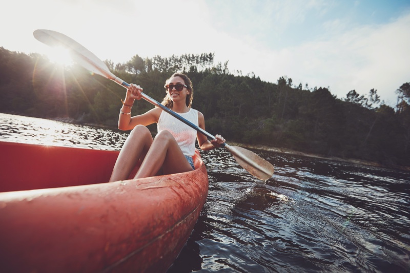 Young Woman Canoe Oar Water