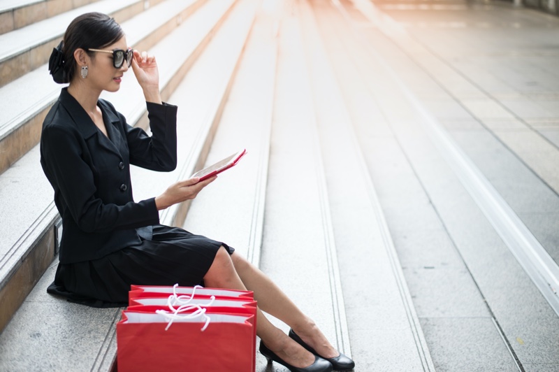 Asian Woman Tablet Shopping Red Bags Black Outfit