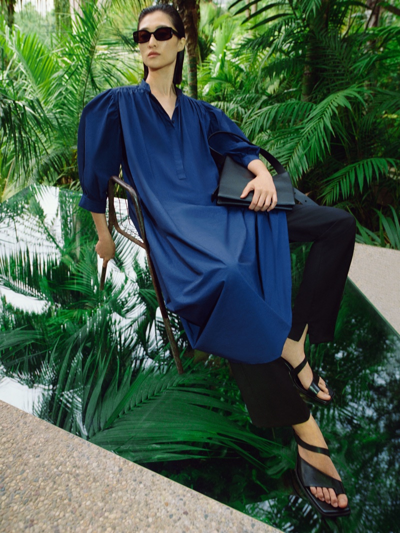 Model Chu Wong poses for COS spring-summer 2022 campaign.