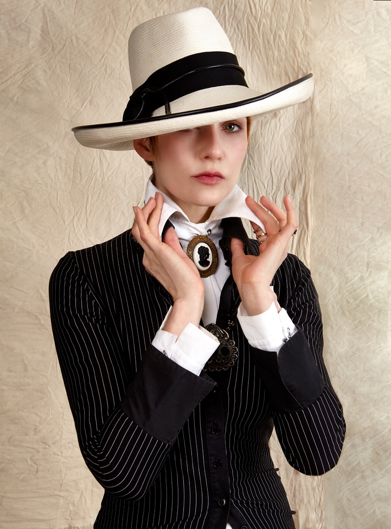 Hat Cha Cha’s House, Layered Blouses 9th by Anne Fontaine, Necklace & Brooch Vintage, and Pants Balenciaga. Photo: Gail Hadani