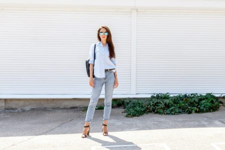 What Jeans Are in Fashion Now? Female Model Blue Shirt Cropped Jeans