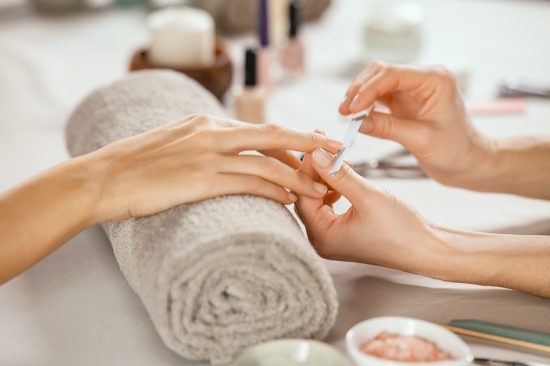 Woman Getting Manicure