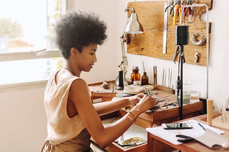 Black Woman Designing Jewelry Work Studio