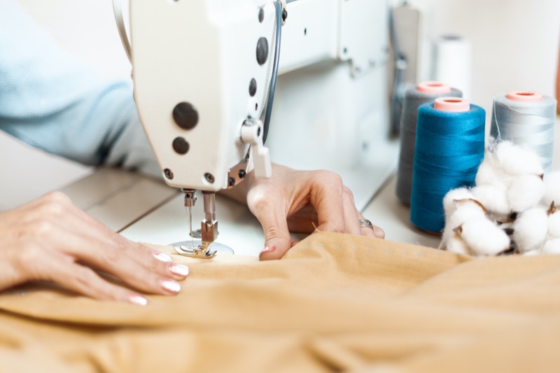 Closeup Woman Hands Fabric Sewing Machine