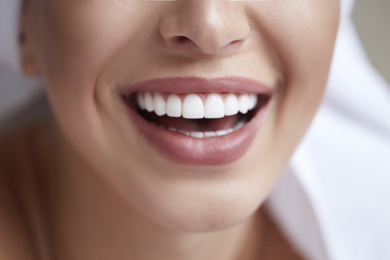 Closeup woman White Teeth