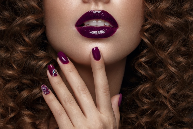 Cropped Model Purple Lipstick Nails Glitter Manicure