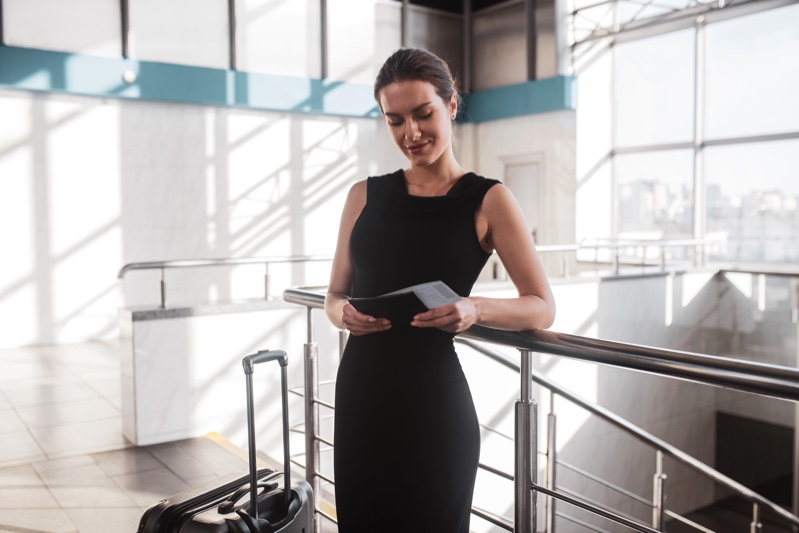 Holding Passport Boarding Pass Woman Black Dress