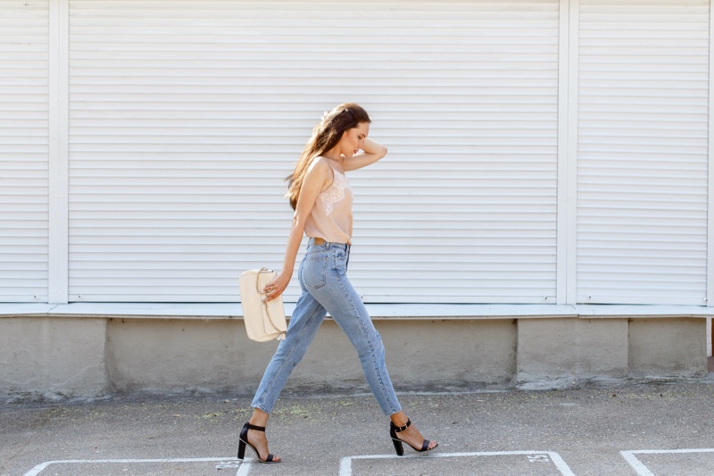 Stylish Woman Walking in Jeans