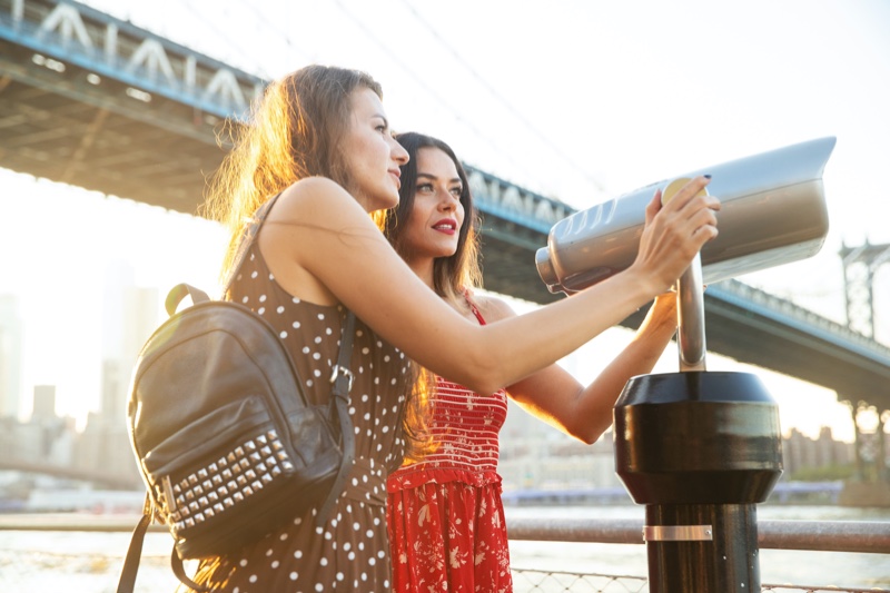 Two Women Telescope Tourists