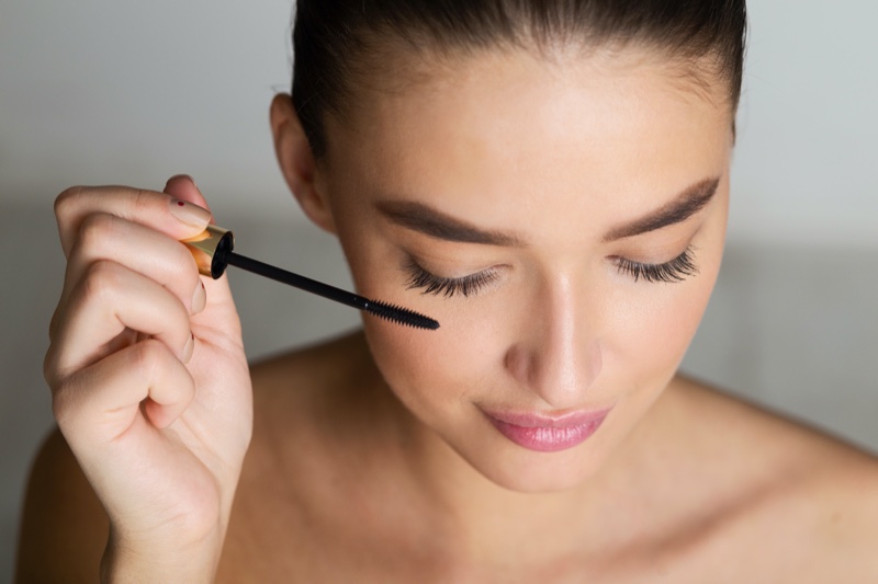 Woman Applying Mascara Face