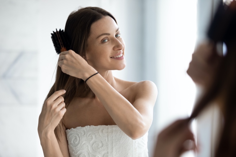 Woman Brushing Hair