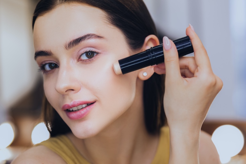 Woman Putting on Makeup