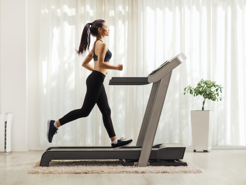 Woman Running on Treadmill