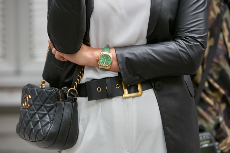 Woman Wearing Gold Rolex Daydate Green