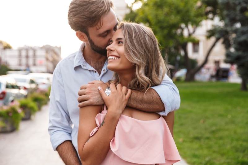 Happy Couple Embracing Smiling