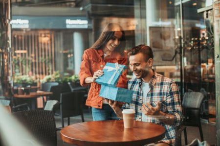 6 Fashionable Items to Gift Your Man Woman Giving Man Gift Cafe