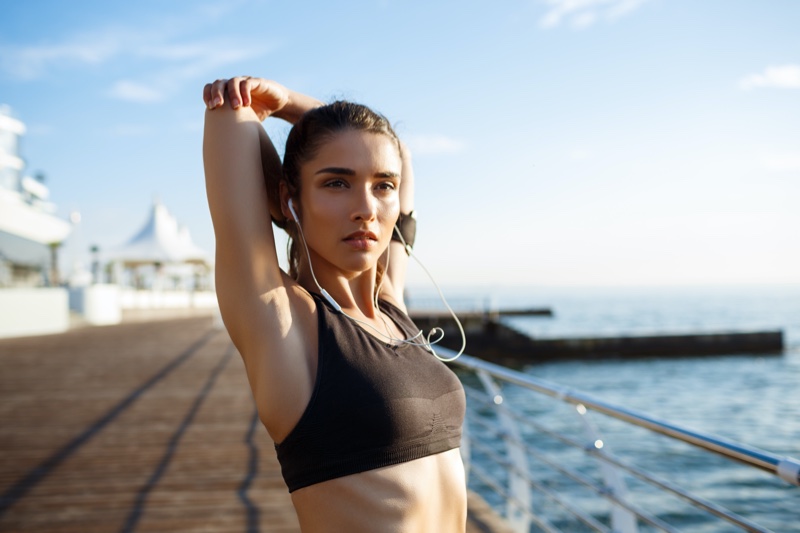 Woman Stretching Black Sports Bra Outside