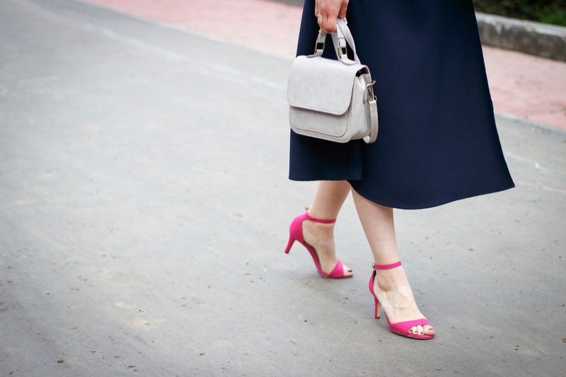 Woman Walking Pink Heeled Sandals Bag
