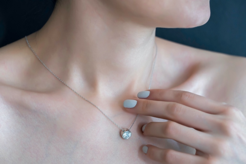 Woman Wearing Diamond Necklace