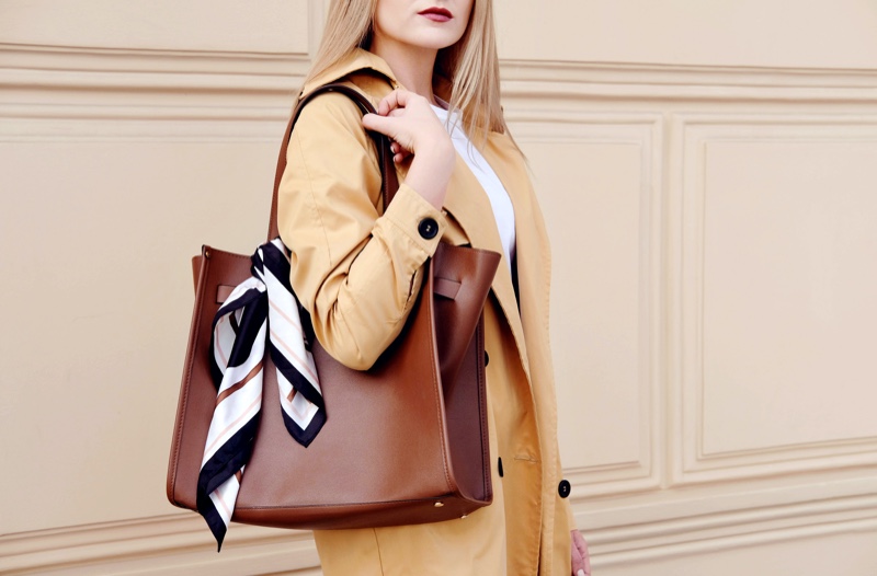 Woman with Scarf Tied on Bag