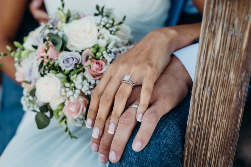 Couple Hands Wedding Rings