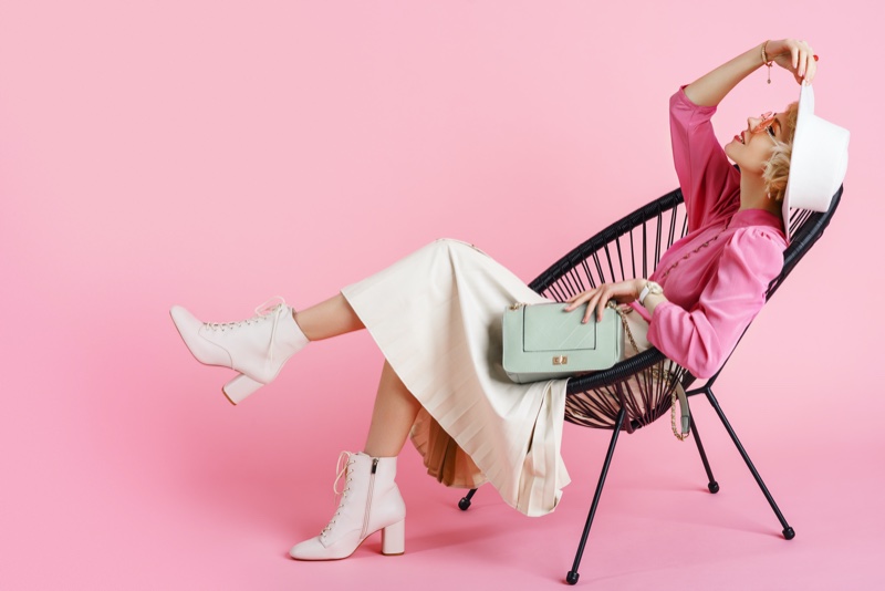 Fashion Model Pink Top White Pleated Skirt Boots