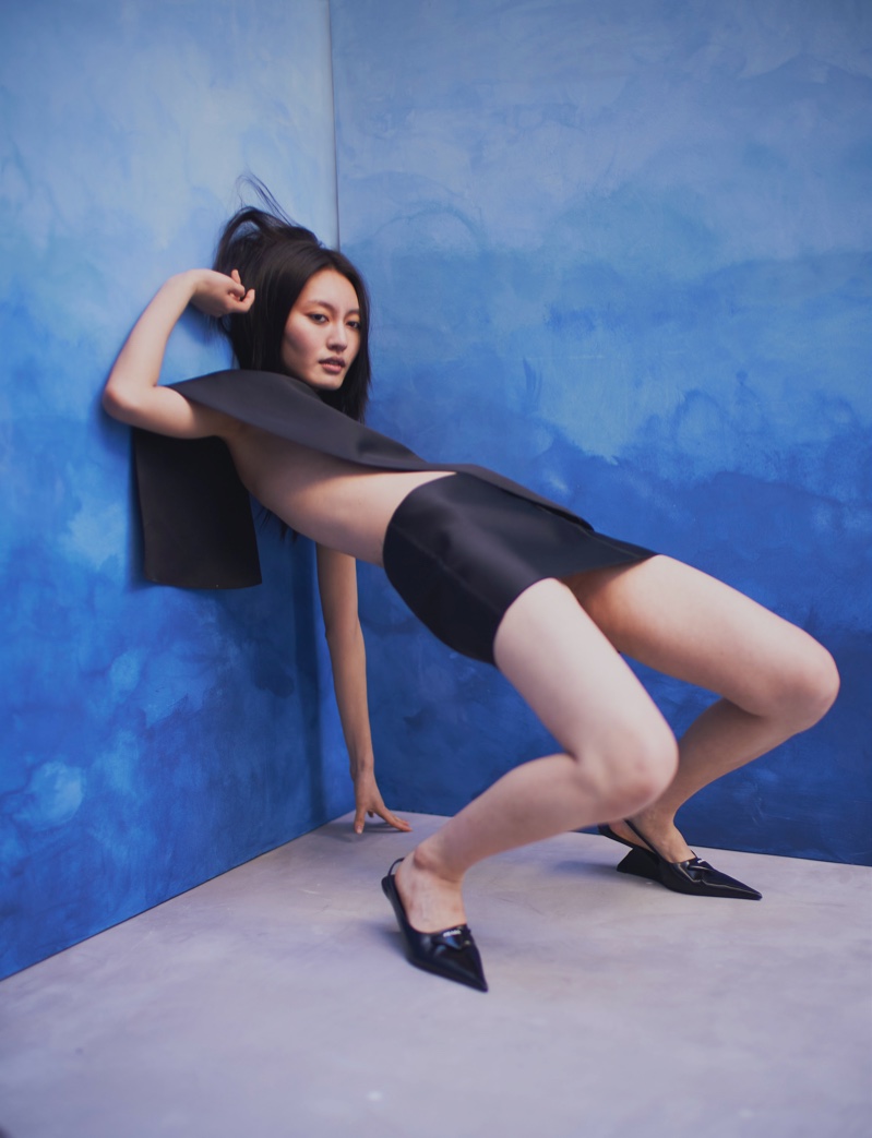 Kollin Poses in Prada Looks for Wonderland Magazine