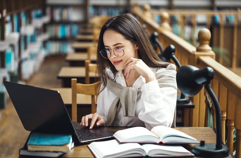 Student Laptop Studying Books