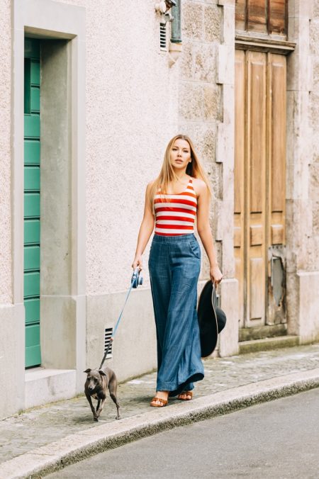 Woman Wide Leg Baggy Denim Jeans Red Striped Tank Walking Dog