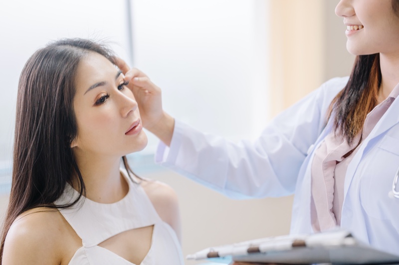 Asian Woman Doctor Post Plastic Surgery Office