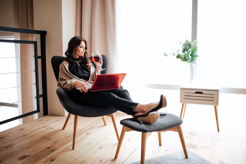 Attractive Woman Relaxing Home Laptop