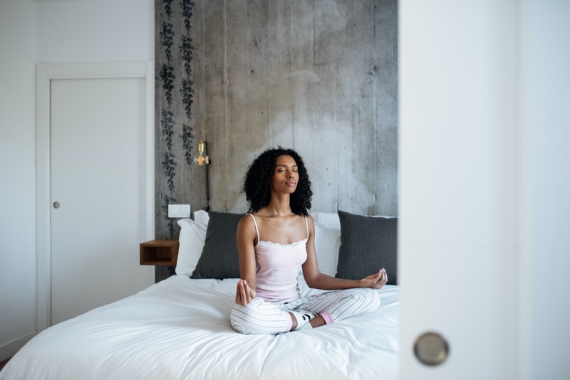 Black Woman Meditating Bed