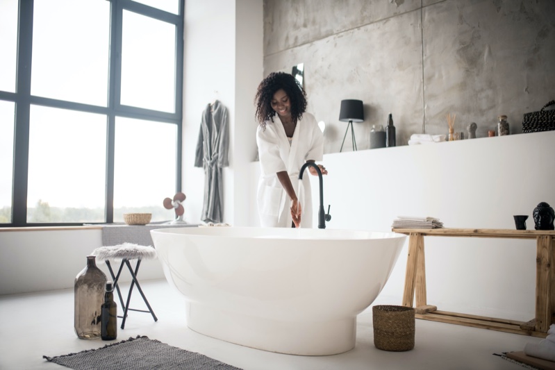 Black Woman Natural Light Tub Bathroom