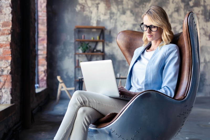 Blonde Woman Office Chair Laptop Glasses