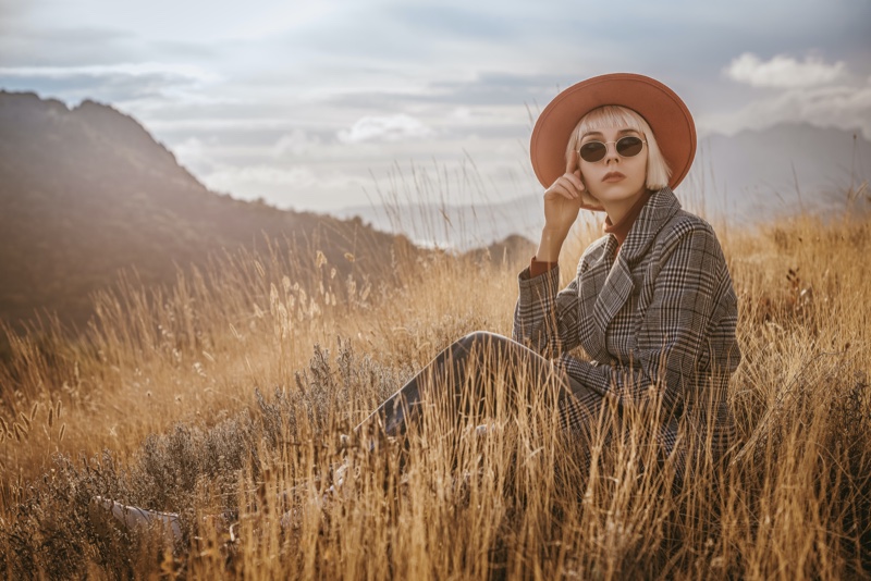 Fashionable Model Outdoors Jacket Hat Sunglasses