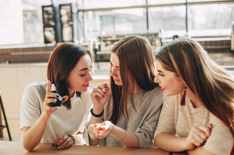 Group Friends Smelling Perfume