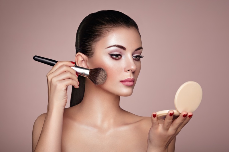 Model Applying Powder Foundation Brush Compact