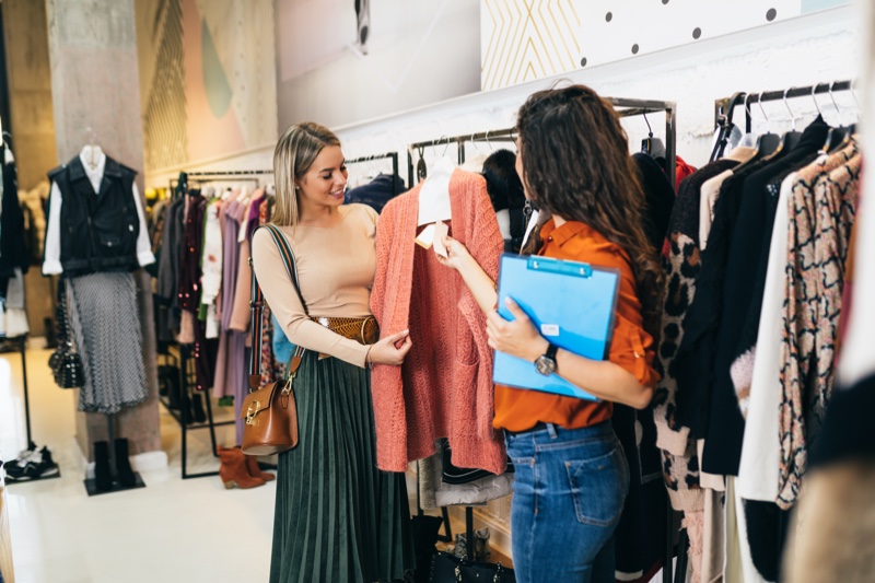 Woman Shopping Clothing Store Employee