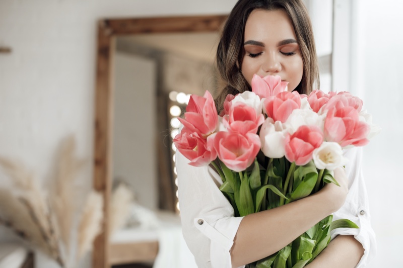 Attractive Woman Flower Gift Smelling