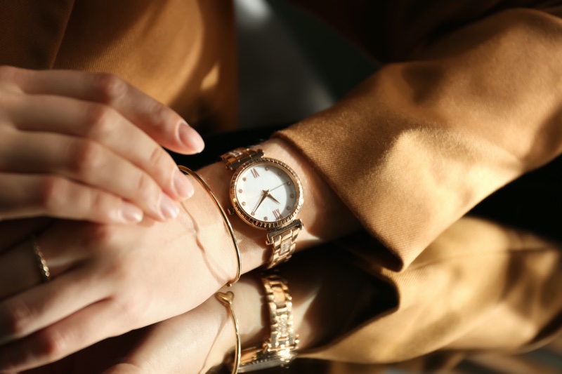 Closeup Woman Gold Luxury Watch