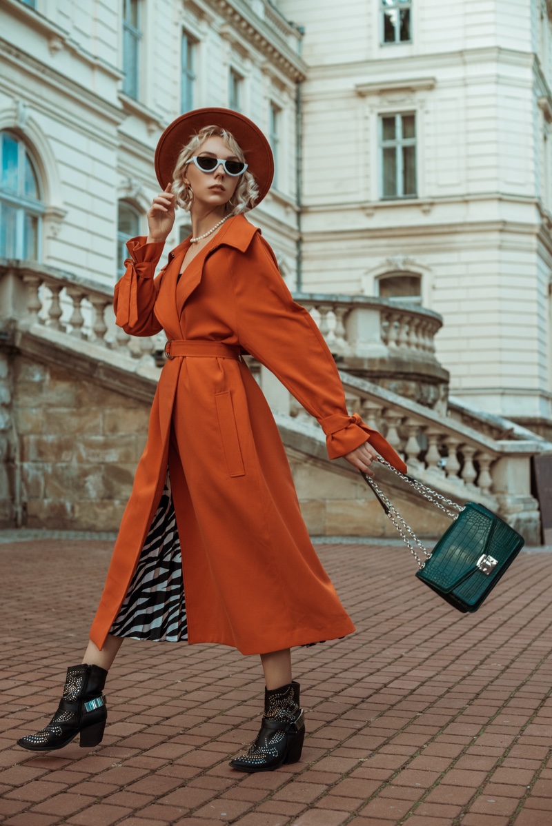 Fashion Model Orange Coat Boots Hat Green Bag