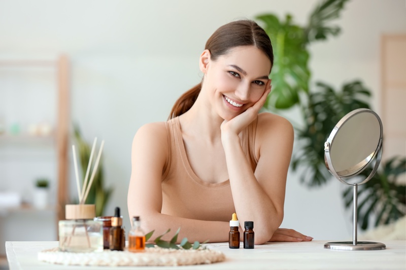 Happy Woman Posing With Oils