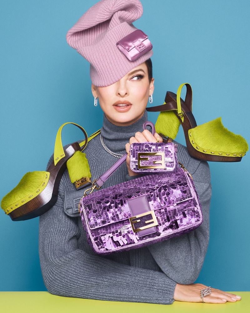 Linda Evangelista models purple sequins for Fendi Baguette 2022 campaign.