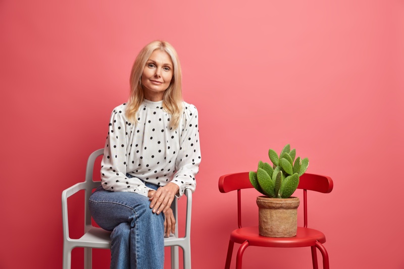 Older Woman Polka Dot Top Jeans Plant