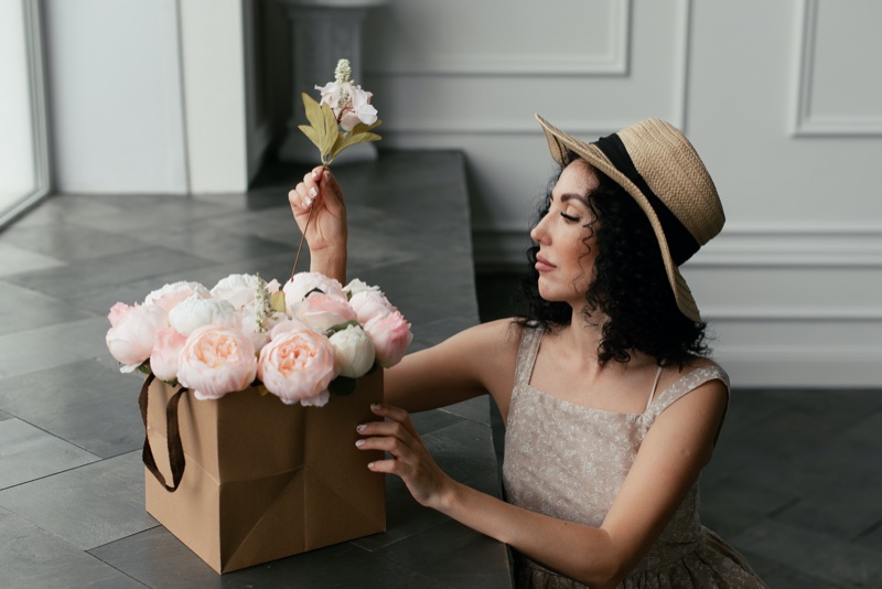 Woman Arranging Flower Bouquet